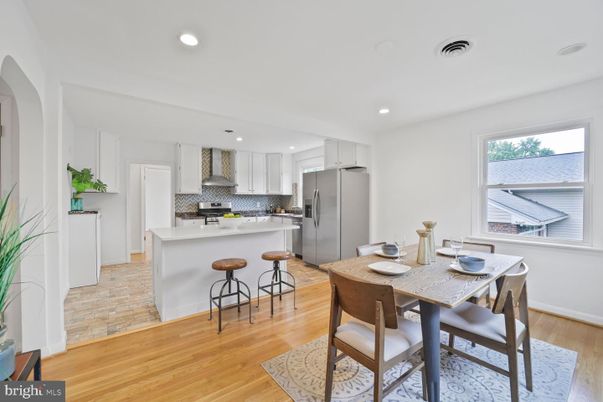 Dining room, Interior, Kitchen, Recessed Lighting, Stainless Steel Appliances, Wood Texture Flooring