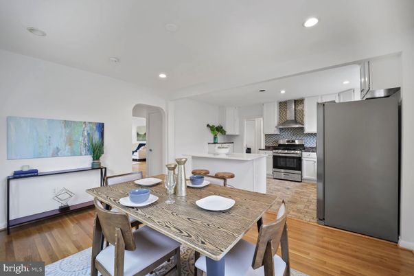 Dining room, Interior, Kitchen, Recessed Lighting, Stainless Steel Appliances, Wood Texture Flooring