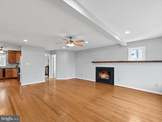 Empty room, Fireplace, Interior, Kitchen, Recessed Lighting, Wood Texture Flooring