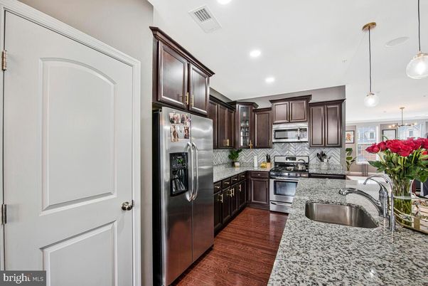 Interior, Kitchen, Pendant Lights, Recessed Lighting, Stainless Steel Appliances, Wood Texture Flooring