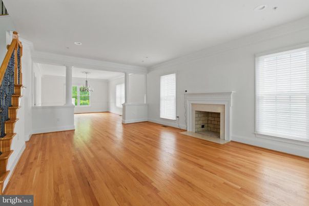 Chandelier, Empty room, Fireplace, Interior, Recessed Lighting, Wood Texture Flooring