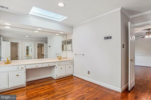 Bathroom, Dual Sink Vanities, Interior, Recessed Lighting, Wood Texture Flooring