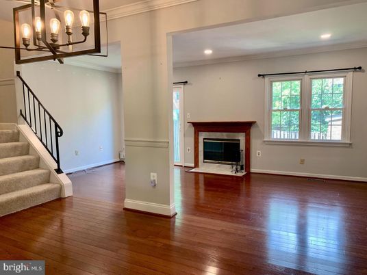 Chandelier, Fireplace, Interior, Recessed Lighting, Wood Texture Flooring