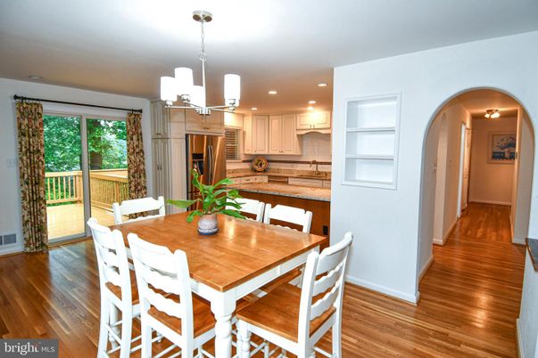 Chandelier, Dining room, Interior, Kitchen, Pendant Lights, Recessed Lighting, Stainless Steel Appliances, Wood Texture Flooring