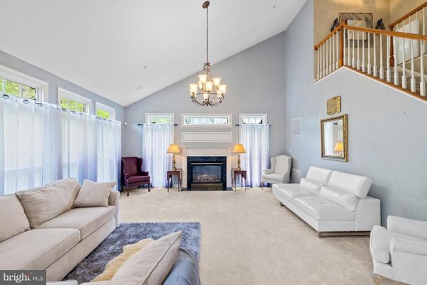 Chandelier, Fireplace, Interior, Living room