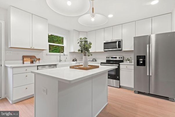 Interior, Kitchen, Pendant Lights, Recessed Lighting, Stainless Steel Appliances, Wood Texture Flooring