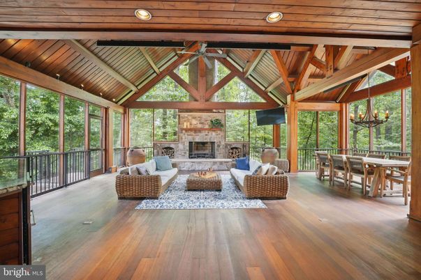 Chandelier, Dining room, Fireplace, Interior, Living room, Recessed Lighting, Wooden Beams, Wooden Ceilings, Wood Texture Flooring