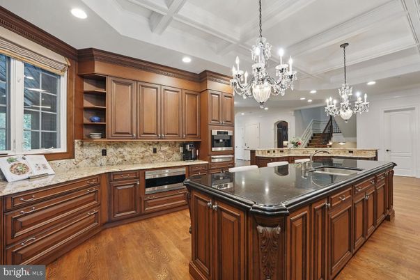Chandelier, Interior, Kitchen, Recessed Lighting, Stainless Steel Appliances, Wood Texture Flooring