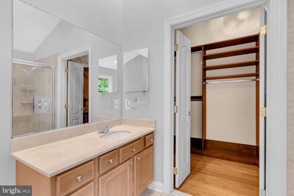 Bathroom, Dual Sink Vanities, Glass Shower, Interior, Wood Texture Flooring