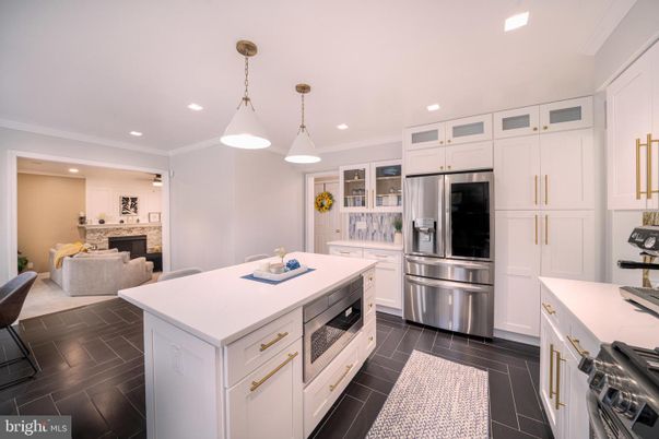 Fireplace, Interior, Kitchen, Pendant Lights, Recessed Lighting, Stainless Steel Appliances, Wood Texture Flooring