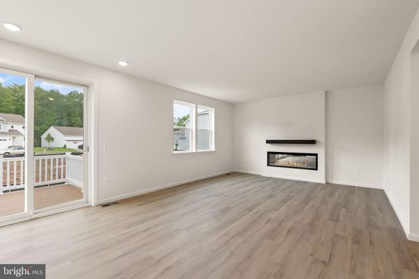 Empty room, Fireplace, Interior, Recessed Lighting, Wood Texture Flooring