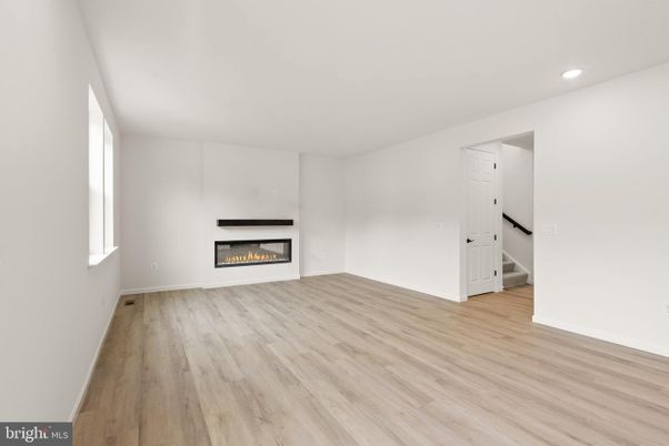 Empty room, Fireplace, Interior, Recessed Lighting, Wood Texture Flooring