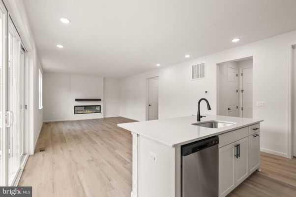 Fireplace, Interior, Kitchen, Recessed Lighting, Wood Texture Flooring