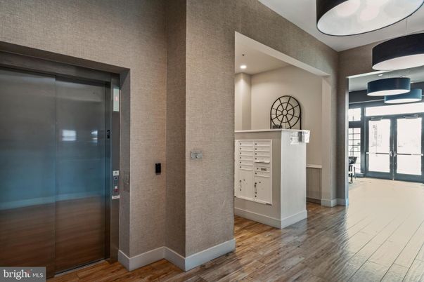 Elevator, Interior, Recessed Lighting, Wood Texture Flooring