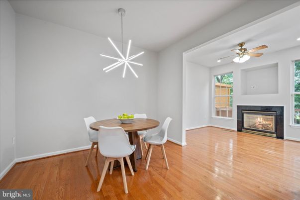 Dining room, Fireplace, Interior, Pendant Lights, Recessed Lighting, Wood Texture Flooring