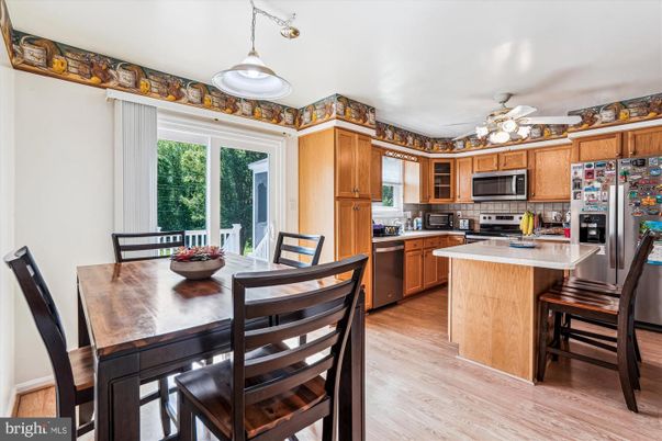 Dining room, Interior, Kitchen, Pendant Lights, Stainless Steel Appliances, Wood Texture Flooring