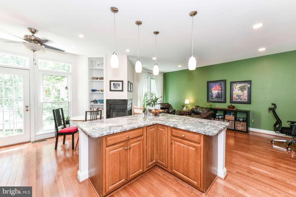 Fireplace, Interior, Pendant Lights, Recessed Lighting, Wood Texture Flooring