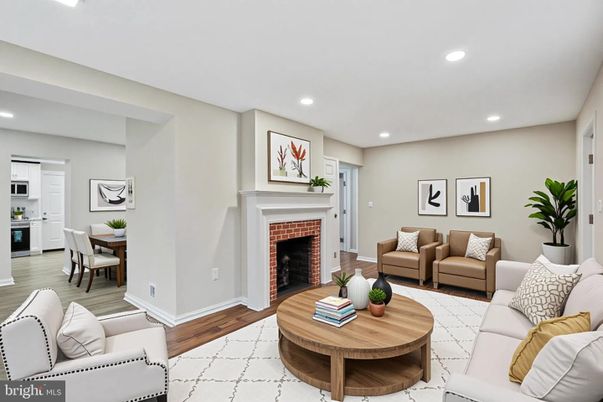 Dining room, Fireplace, Interior, Living room, Recessed Lighting, Wood Texture Flooring