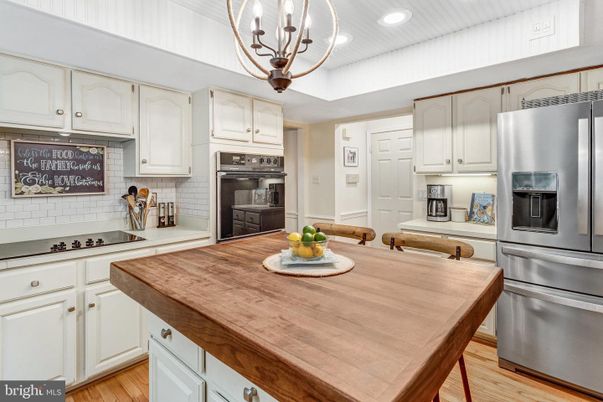 Chandelier, Interior, Kitchen, Recessed Lighting, Stainless Steel Appliances, Wood Texture Flooring