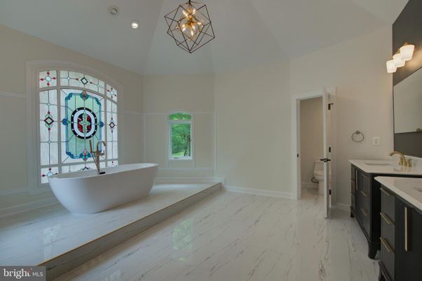 Bathroom, Chandelier, Dual Sink Vanities, Free Standing Baths, Interior, Marble, Recessed Lighting