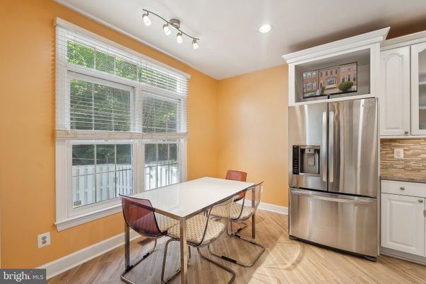 Dining room, Interior, Kitchen, Recessed Lighting, Stainless Steel Appliances, Wood Texture Flooring