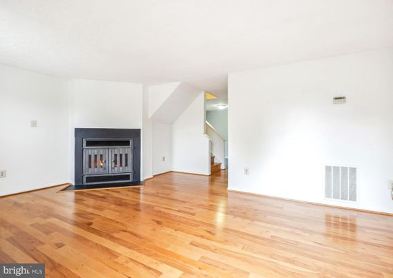 Empty room, Fireplace, Interior, Recessed Lighting, Wood Texture Flooring