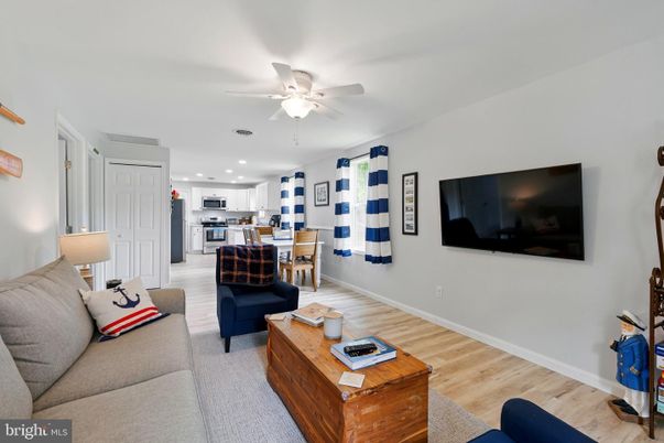Dining room, Interior, Kitchen, Living room, Recessed Lighting, Stainless Steel Appliances, Wood Texture Flooring