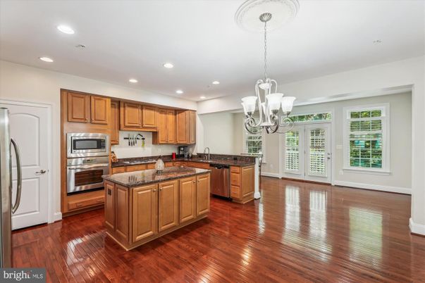 Chandelier, Interior, Kitchen, Recessed Lighting, Stainless Steel Appliances, Wood Texture Flooring