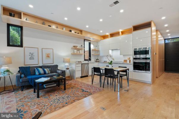 Dining room, Interior, Kitchen, Living room, Recessed Lighting, Stainless Steel Appliances, Wood Texture Flooring