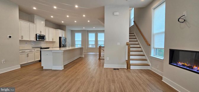 Fireplace, Interior, Kitchen, Recessed Lighting, Wood Texture Flooring