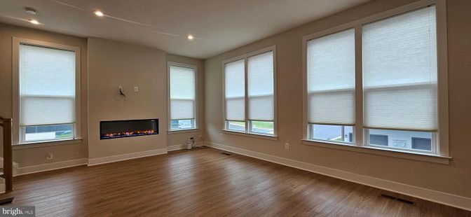 Empty room, Fireplace, Interior, Recessed Lighting, Wood Texture Flooring