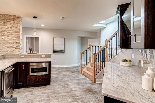 Interior, Kitchen, Pendant Lights, Recessed Lighting, Stainless Steel Appliances, Stone Walls, Wood Texture Flooring