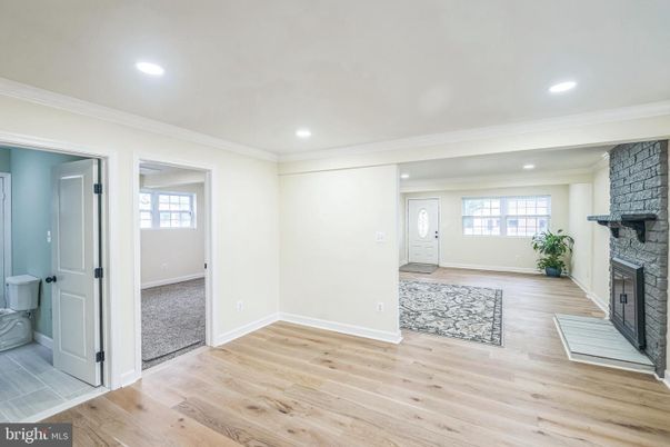Empty room, Fireplace, Interior, Recessed Lighting, Wood Texture Flooring