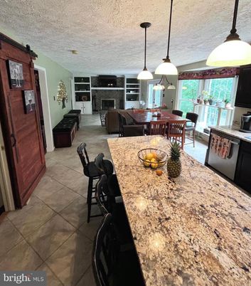 Dining room, Fireplace, Interior, Kitchen, Living room, Pendant Lights