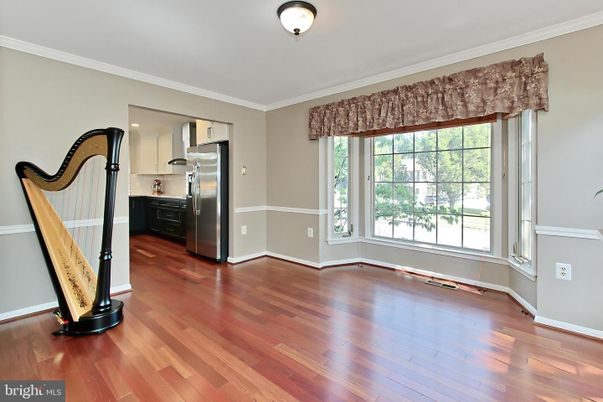 Empty room, Interior, Kitchen, Stainless Steel Appliances, Wood Texture Flooring