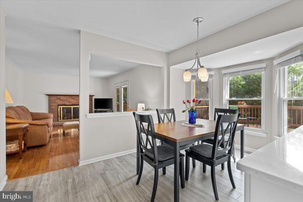Dining room, Fireplace, Interior, Pendant Lights, Wood Texture Flooring