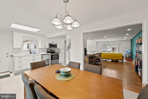 Chandelier, Dining room, Interior, Kitchen, Living room, Recessed Lighting, Stainless Steel Appliances, Wood Texture Flooring