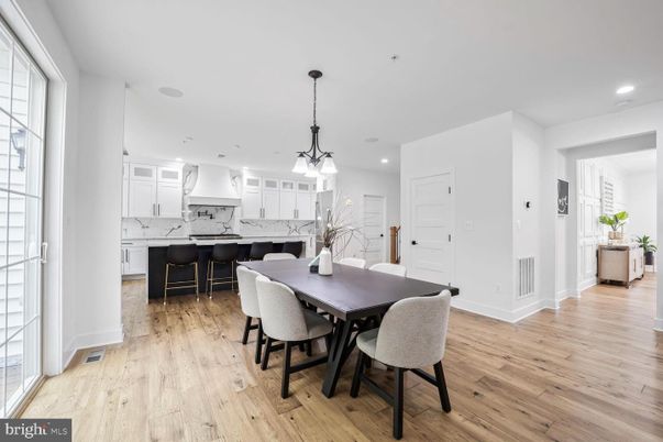 Dining room, Interior, Kitchen, Marble Walls, Pendant Lights, Recessed Lighting, Wood Texture Flooring
