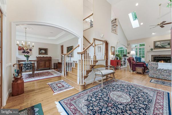 Chandelier, Fireplace, Interior, Living room, Recessed Lighting, Wood Texture Flooring