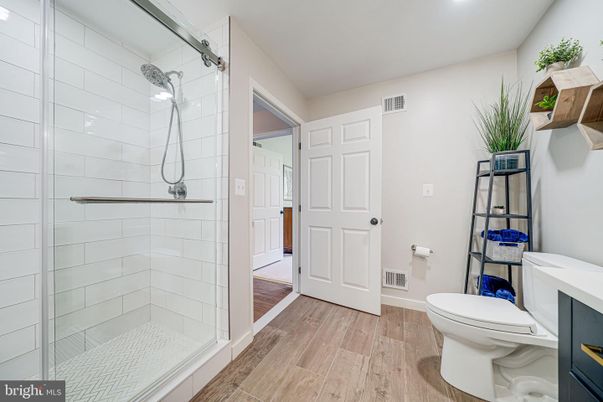 Bathroom, Glass Shower, Interior, Recessed Lighting, Wood Texture Flooring
