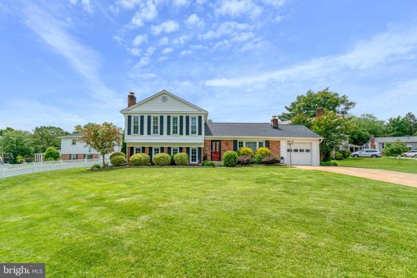 Attached, Backyard, Exterior, Facade, Brick Facade, Split Level