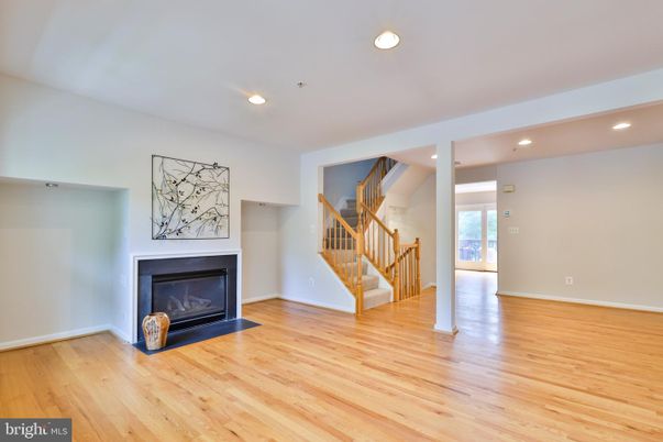Empty room, Fireplace, Interior, Recessed Lighting, Wood Texture Flooring