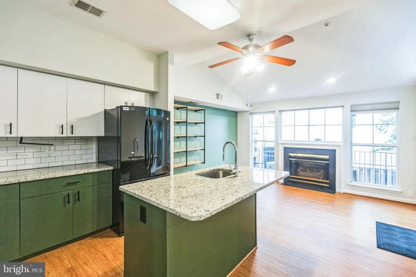 Fireplace, Interior, Kitchen, Recessed Lighting, Wood Texture Flooring