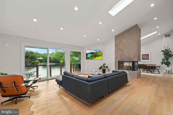 Dining room, Fireplace, Interior, Living room, Recessed Lighting, Wood Texture Flooring