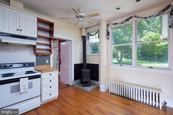 Fireplace, Interior, Kitchen, Recessed Lighting, Wood Texture Flooring