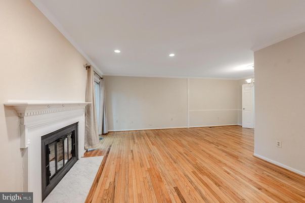 Empty room, Fireplace, Interior, Recessed Lighting, Wood Texture Flooring