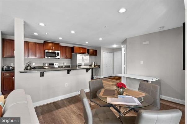 Dining room, Interior, Kitchen, Recessed Lighting, Stainless Steel Appliances, Wood Texture Flooring
