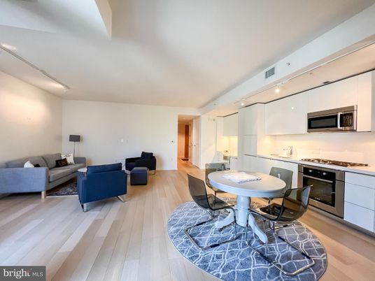 Dining room, Interior, Kitchen, Living room, Recessed Lighting, Stainless Steel Appliances, Wood Texture Flooring