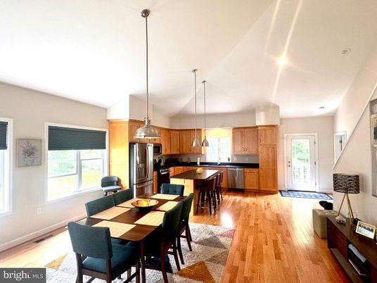 Dining room, Interior, Kitchen, Pendant Lights, Stainless Steel Appliances, Wood Texture Flooring