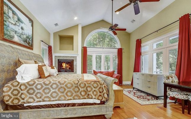 Bedroom, Fireplace, Interior, Recessed Lighting, Wood Texture Flooring